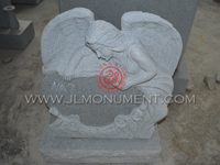 Beautifully sculpted Angel headstone of resting on top of a heart with flowers. The angel Heastone is fully carved on all sides.,and G633 and Angel Headstone-007