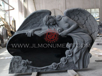 sculpted headstone of an angel reclining on a single heart ,and Absolute Black and Angel Headstone-018