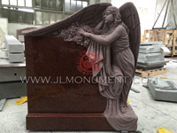 A beautifully angel headstone of an angel with flowers. The angel is fully carved on all sides.,and Indian Red and Angel Headstone-098